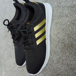 Adidas black and gold sneakers